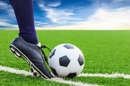 foot kicking a ball